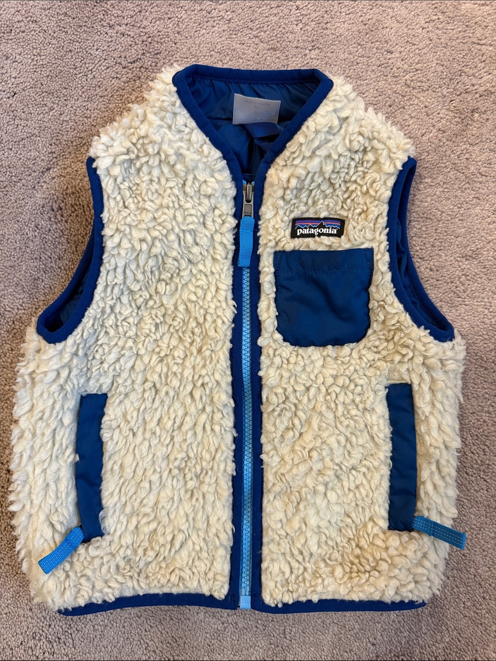 Patagonia Kids Cream Sherpa Vest with Blue Trim and Pockets